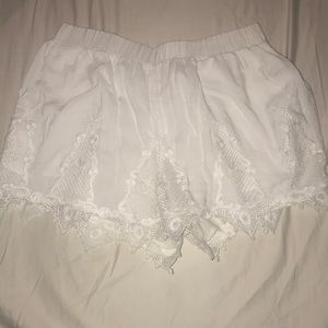 White lace shorts